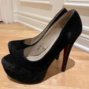 Black velour heels with red underneath